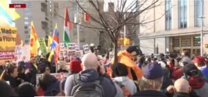 Paid Professional Protesters Flood New York for Maduro Trial with Identical Signs