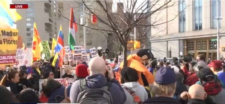 Paid Professional Protesters Flood New York for Maduro Trial with Identical Signs